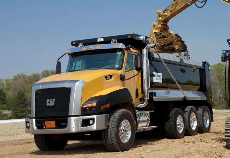Cat construction clearance trucks