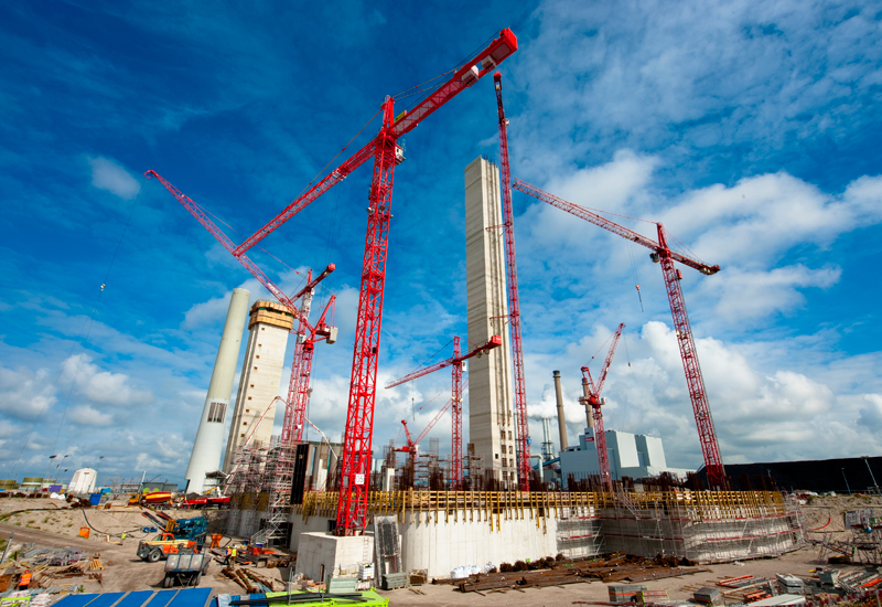 Wolffkran cranes, big and small, support the construction of a powerstation’s core and walls in the Netherlands. Wolffkran cranes, big and small, support the construction of a powerstation’s core and walls in the Netherlands.