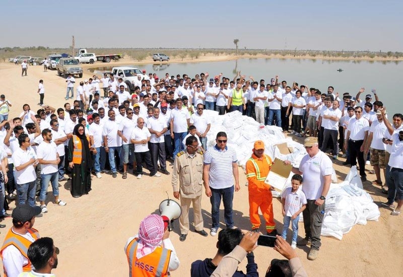 Participants in the Al-Futtaim Motors clean-up gather for a congratulatory closing ceremony to the proceedings. Participants in the Al-Futtaim Motors clean-up gather for a congratulatory closing ceremony to the proceedings.