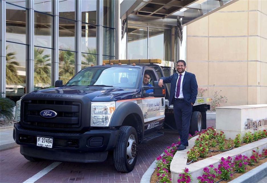 Bassam Shadid, transportation manager at Al Tayer Motors, stands alongside the milestone vehicle, driven by an Al Tayer staff member. Bassam Shadid, transportation manager at Al Tayer Motors, stands alongside the milestone vehicle, driven by an Al Tayer staff member.