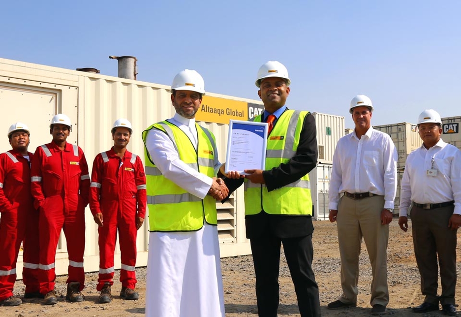 Majid Zahid, chief commercial officer for Altaaqa Global (L) is handed the ISO 50001 certification by Shibu Davies, GM for certification at TÜV Nord. Majid Zahid, chief commercial officer for Altaaqa Global (L) is handed the ISO 50001 certification by Shibu Davies, GM for certification at TÜV Nord.