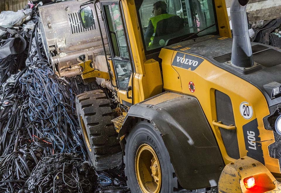 A Volvo CE L60G wheel loader equipped with BKT Earthmax SR 53 tyres for material handling operations. A Volvo CE L60G wheel loader equipped with BKT Earthmax SR 53 tyres for material handling operations.