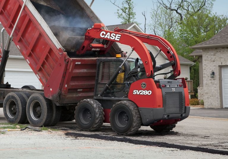 A limited edition SV280 skidsteer loader with red livery and anniversary insignia. A limited edition SV280 skidsteer loader with red livery and anniversary insignia.