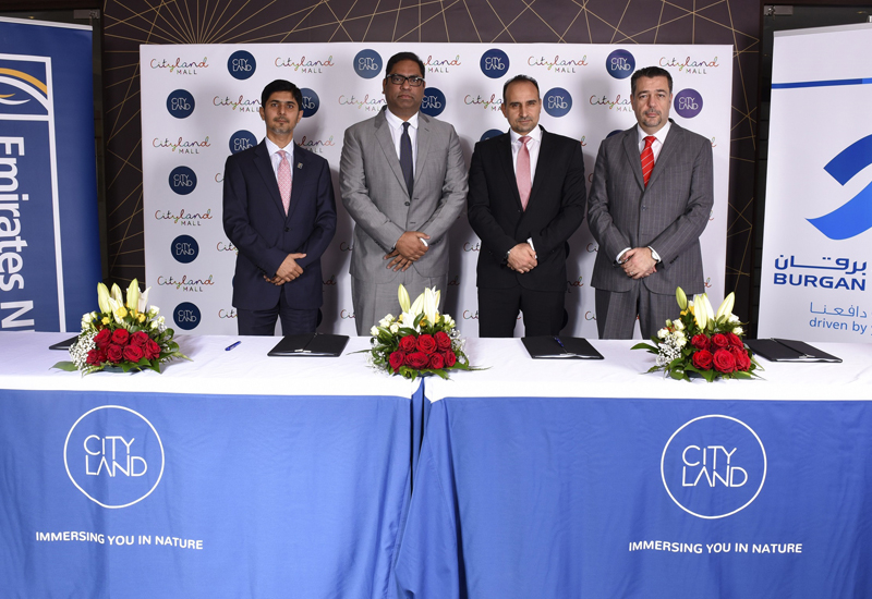 L-R: Emirates NBD’s Syed Navid Murtaza and Fahimuddin Sharfuddin; Cityland Group’s Abdel Naser Rahal; and Burgan Bank’s Dany Noujaim. L-R: Emirates NBD’s Syed Navid Murtaza and Fahimuddin Sharfuddin; Cityland Group’s Abdel Naser Rahal; and Burgan Bank’s Dany Noujaim.