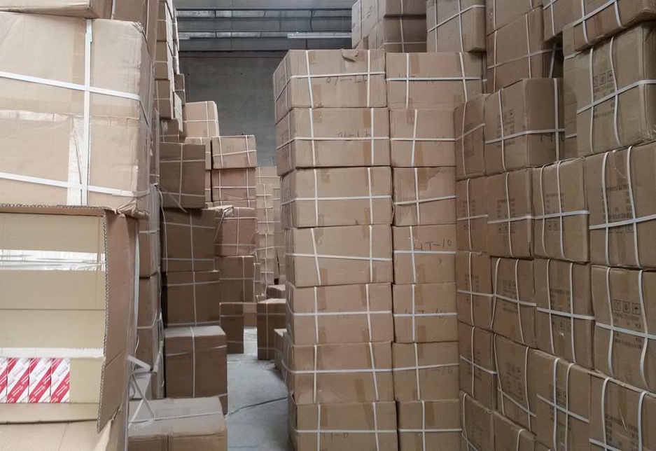 Stacked boxes of counterfeit parts seized by Al Ain Economic Development Department. Stacked boxes of counterfeit parts seized by Al Ain Economic Development Department.