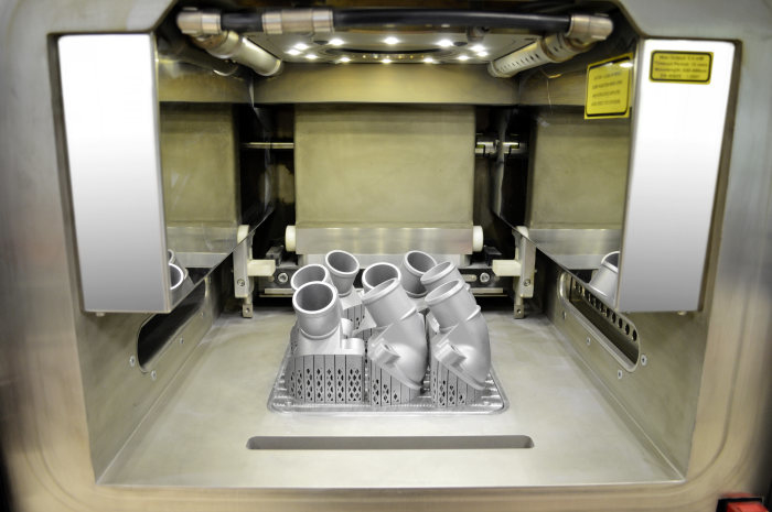 After the aluminium/silicon metallic powder is removed by suction, the, the first printed thermostat covers emerge, still connected to the work platform. After the aluminium/silicon metallic powder is removed by suction, the, the first printed thermostat covers emerge, still connected to the work platform.