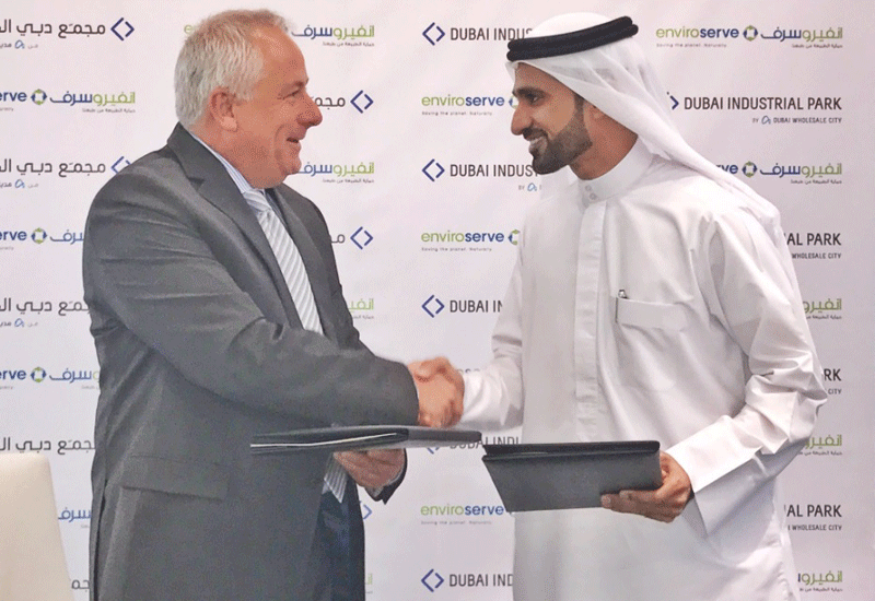 Abdulla Belhoul of Dubai Wholesale City, and Stuart Fleming of Enviroserve UAE signed the contract. Abdulla Belhoul of Dubai Wholesale City, and Stuart Fleming of Enviroserve UAE signed the contract.