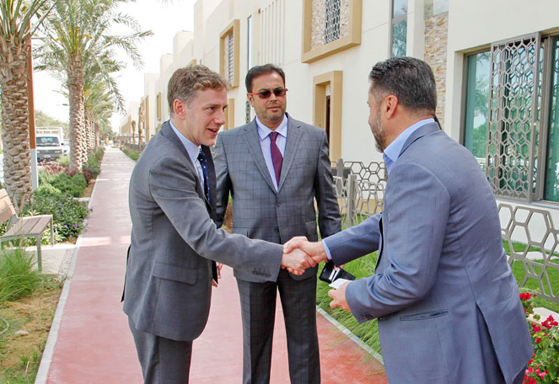 Engineer Faris Saeed, CEO and founder of Diamond Developers, greeting guests. Engineer Faris Saeed, CEO and founder of Diamond Developers, greeting guests.
