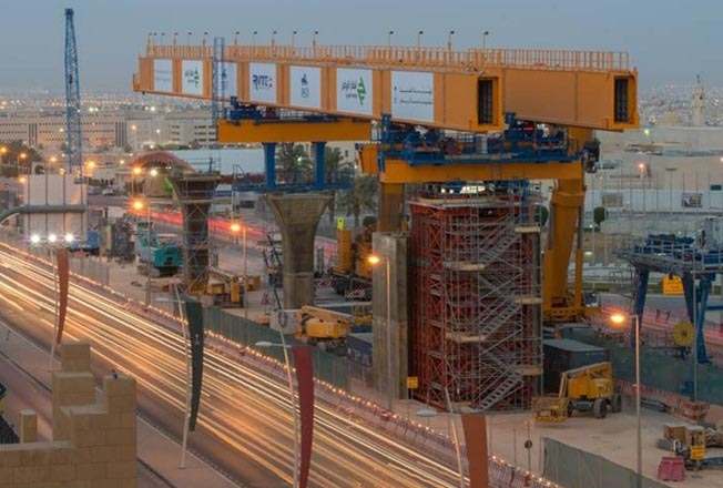 Haulotte machines support a gantry-type erection machine at work on the Riyadh Metro. Haulotte machines support a gantry-type erection machine at work on the Riyadh Metro.