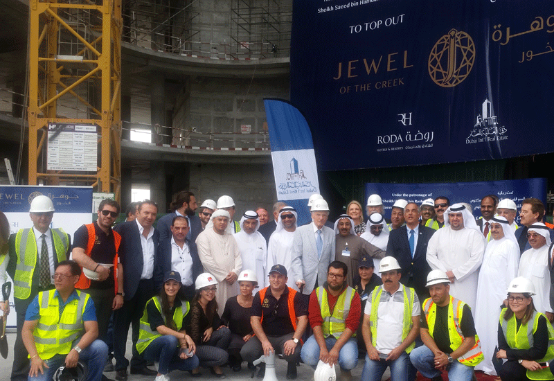 Numerous officials attended the topping out ceremony of Jewel of the Creek. Numerous officials attended the topping out ceremony of Jewel of the Creek.