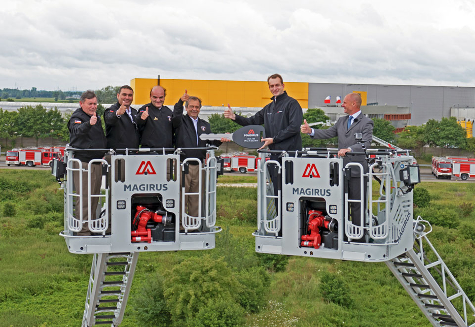 The handover was conducted 30m above ground by Magirus CEO Marc Diening on two Magirus M42L-AS articulated turntable ladders in Germany. The handover was conducted 30m above ground by Magirus CEO Marc Diening on two Magirus M42L-AS articulated turntable ladders in Germany.