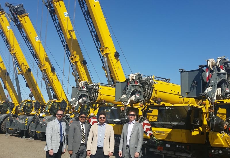 Staff from Manitowoc and Equipment Co celebrating the sale of 13 Grove cranes to Arabi Enertech. Staff from Manitowoc and Equipment Co celebrating the sale of 13 Grove cranes to Arabi Enertech.
