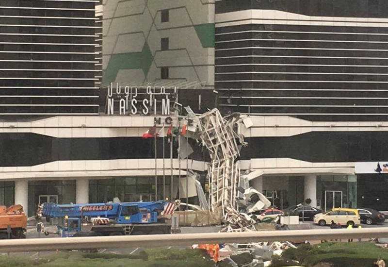 A tower crane collapsed at Dubai’s Nassima Royal Hotel on Friday amid unusually high winds. A tower crane collapsed at Dubai’s Nassima Royal Hotel on Friday amid unusually high winds.