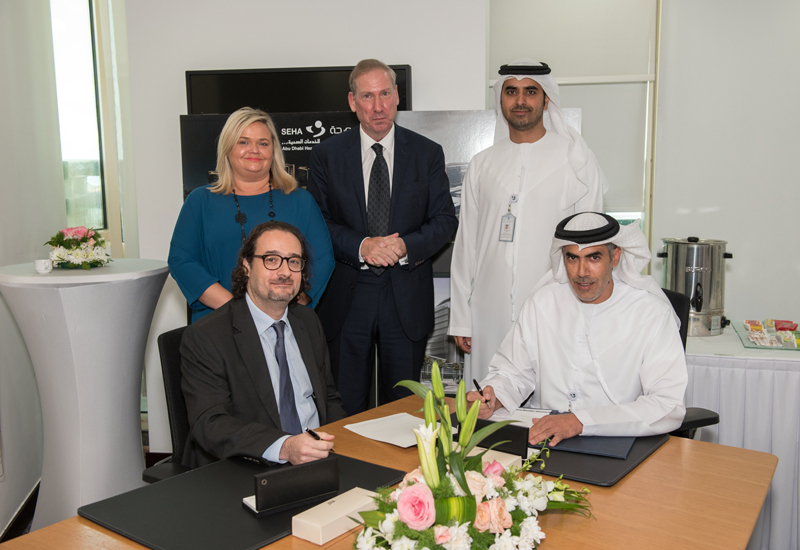 Standing from left to right: Fiona McDonnell (OCS general manager) Martin Logue (OCS Middle East managing director) Engr. Mohammed Hassan Al Zaabi (SEHA Group chief operations officer). Sitting from left to right: Ziad Al Askari (COO & chairman) and Mohammed Hareb Al Qemsi (group chief support services officer). Standing from left to right: Fiona McDonnell (OCS general manager) Martin Logue (OCS Middle East managing director) Engr. Mohammed Hassan Al Zaabi (SEHA Group chief operations officer). Sitting from left to right: Ziad Al Askari (COO & chairman) and Mohammed Hareb Al Qemsi (group chief support services officer).