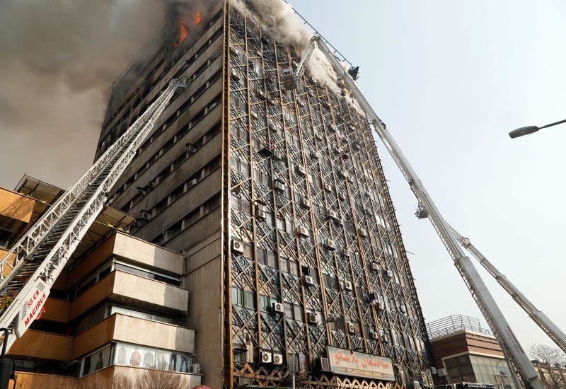 The Plasco building in downtown Tehran collapsed after a fire raged through its upper floors. The Plasco building in downtown Tehran collapsed after a fire raged through its upper floors.