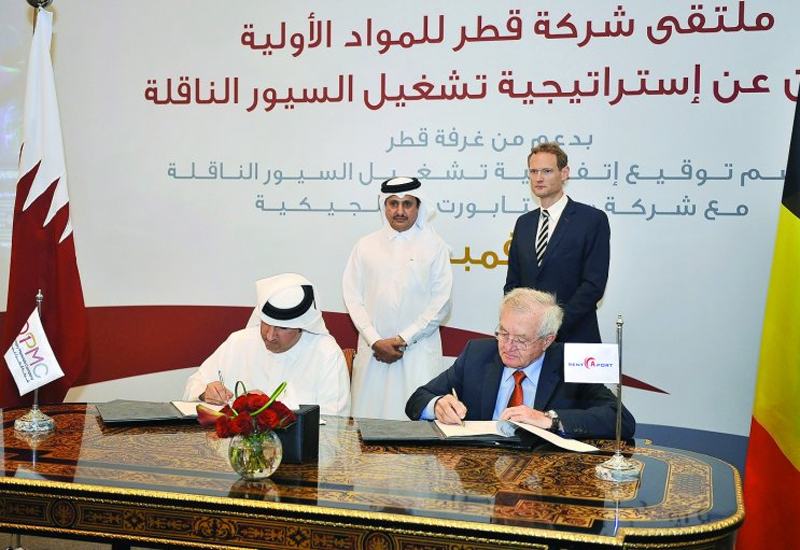 Eisa Al Hammadi, (left) QPMC Chief Executive Officer, and Marcel Van Bouwel, General Manager of Rent-A-Port, signing the contract in the presence of Sheikh Khalifa bin Jassim Al Thani and Christophe Payot, Ambassador of Belgium, in Doha yesterday. (Pic:Baher Amin / The Peninsula.) Eisa Al Hammadi, (left) QPMC Chief Executive Officer, and Marcel Van Bouwel, General Manager of Rent-A-Port, signing the contract in the presence of Sheikh Khalifa bin Jassim Al Thani and Christophe Payot, Ambassador of Belgium, in Doha yesterday. (Pic:Baher Amin / The Peninsula.)