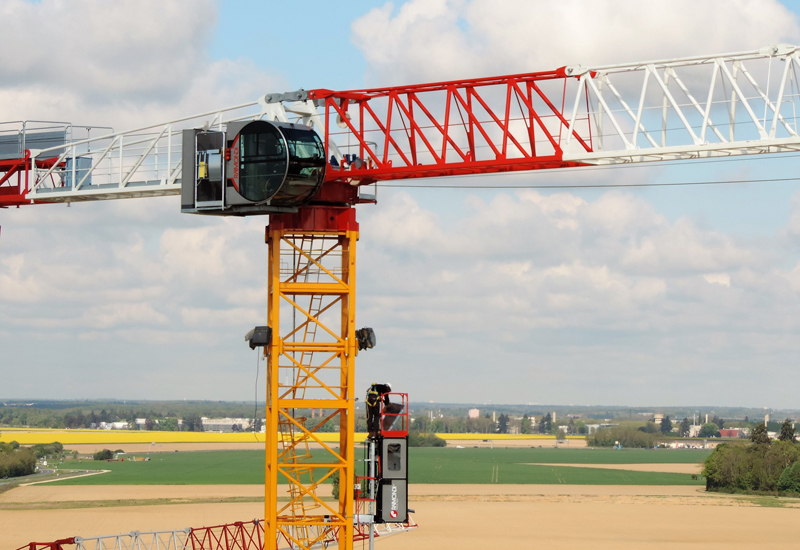 A Raimondi MRT294 tower crane fitted with the Deluxe R16 cabin and elevator. A Raimondi MRT294 tower crane fitted with the Deluxe R16 cabin and elevator.