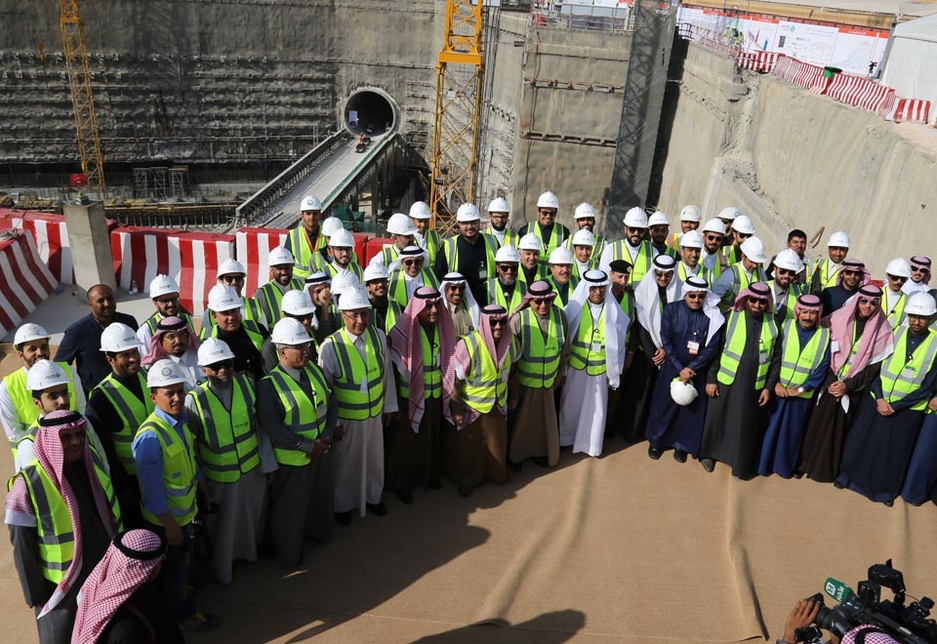 Workers pose with Riyadh's governor at the construction site for the Downtown Station. Workers pose with Riyadh's governor at the construction site for the Downtown Station.
