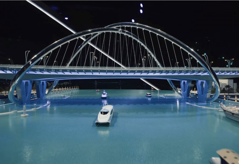 Shindagha Bridge features an infinity-shaped arch. Shindagha Bridge features an infinity-shaped arch.
