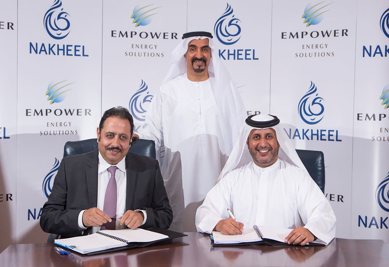 Ahmad Bin Shafar, CEO of Empower and Sanjay Manchanda, CEO of Nakheel sign the deal. Ahmad Bin Shafar, CEO of Empower and Sanjay Manchanda, CEO of Nakheel sign the deal.