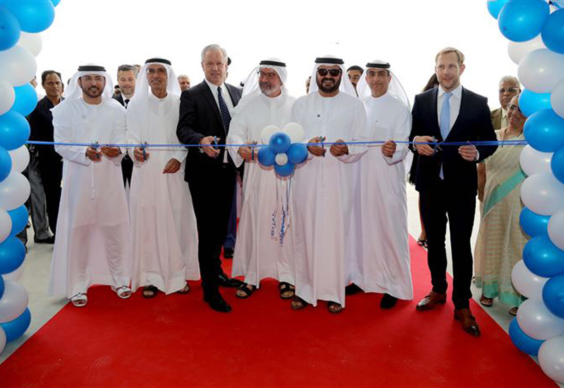 Dignitaries cut the ribbon to inaugurate the $10.8m Dubai warehouse. Dignitaries cut the ribbon to inaugurate the $10.8m Dubai warehouse.