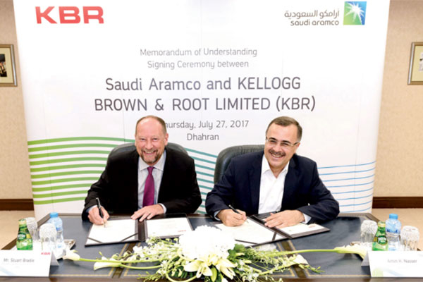 Amin Nasser (right) and Stuart Bradie signing the agreement. Amin Nasser (right) and Stuart Bradie signing the agreement.