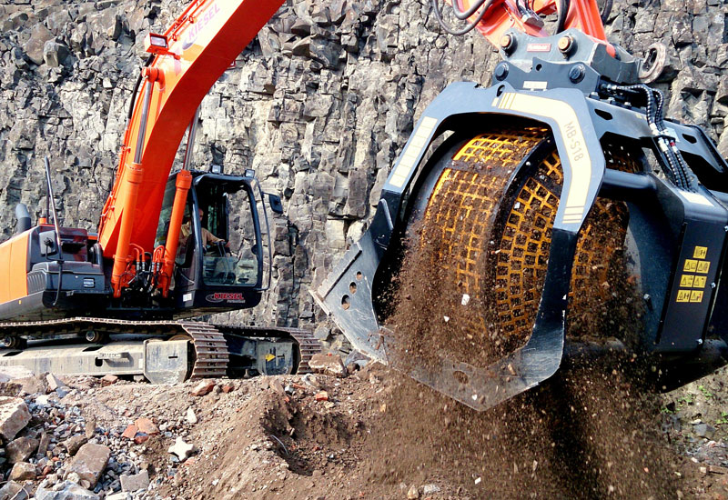 A bucket screener from Italy’s MB Crusher sorts loose aggregates through its rotating drum equipped with a mesh size optimised for the task at hand. A bucket screener from Italy’s MB Crusher sorts loose aggregates through its rotating drum equipped with a mesh size optimised for the task at hand.