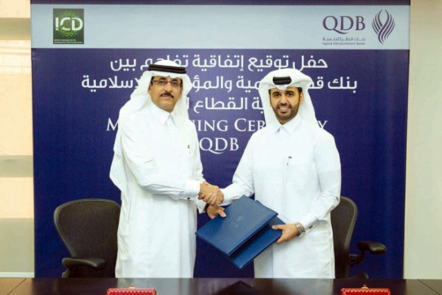 Khaled Mohammed Al-Aboodi (left), Chief Executive Officer and General Manager of ICD; and Abdulaziz Nasser Al Khalifa, Chief Executive Officer of QDB, shake hands after the signing of MoU (image: Saudi Gazette) Khaled Mohammed Al-Aboodi (left), Chief Executive Officer and General Manager of ICD; and Abdulaziz Nasser Al Khalifa, Chief Executive Officer of QDB, shake hands after the signing of MoU (image: Saudi Gazette)