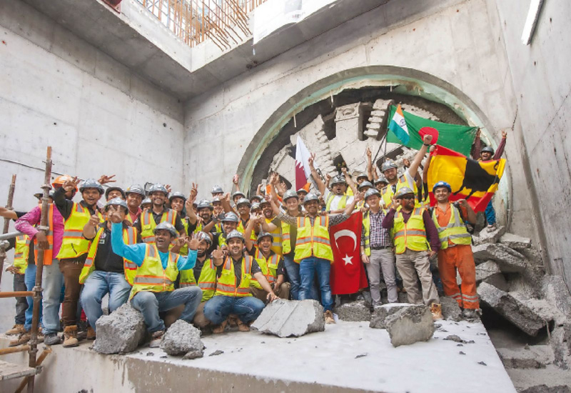 The Green Line team pose in front of the TBM that signals the end of tunnelling for this section of the railway line. (Image The Peninsula) The Green Line team pose in front of the TBM that signals the end of tunnelling for this section of the railway line. (Image The Peninsula)