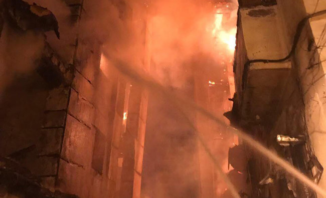 The fire resulted in the collapse of three buildings. The fire resulted in the collapse of three buildings.