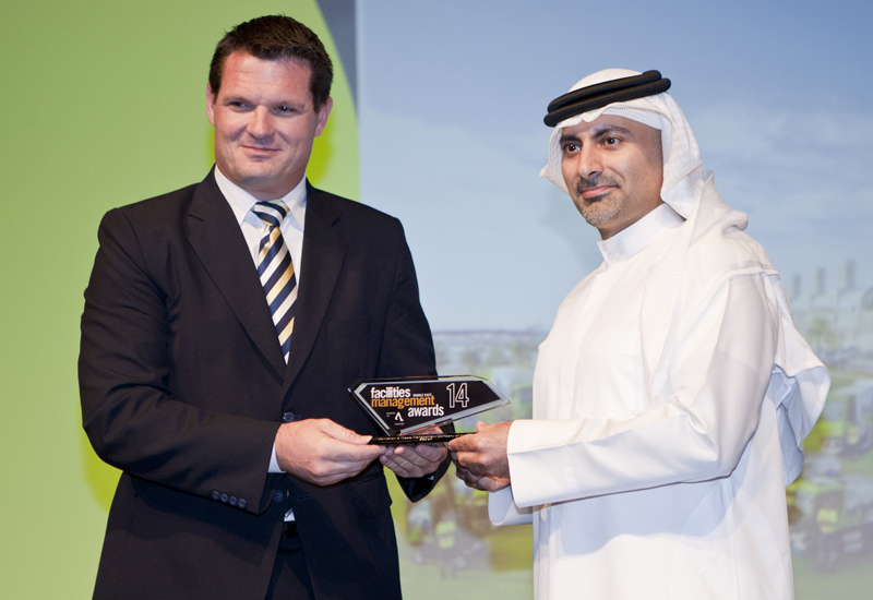 Jason Ruehland, managing director, Emrill, (left) presents the 2014 fmME Award for Sanitation & Waste Management Company of the Year to Khaled Al Hura Jason Ruehland, managing director, Emrill, (left) presents the 2014 fmME Award for Sanitation & Waste Management Company of the Year to Khaled Al Hura