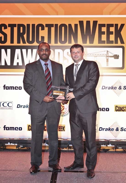 Construction Week’s Group sales manager Mark Palmer presents the award to Ahmed Zeinelabdin from Atkins Global. Construction Week’s Group sales manager Mark Palmer presents the award to Ahmed Zeinelabdin from Atkins Global.
