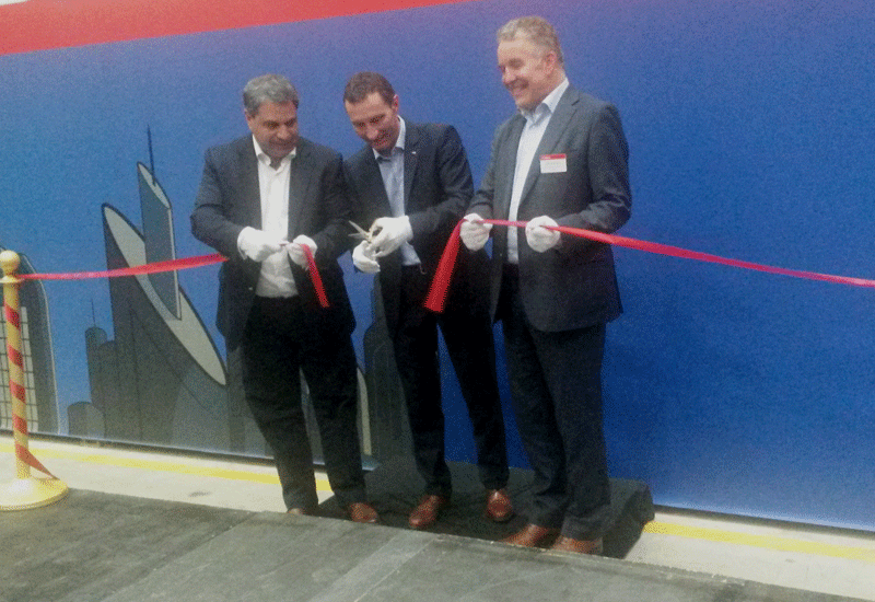 Rhayem (left), Knoetgen (centre), and Van Der Goot (right) cut the ribbon at the official inauguration of Doosan’s Jafza PDC. Rhayem (left), Knoetgen (centre), and Van Der Goot (right) cut the ribbon at the official inauguration of Doosan’s Jafza PDC.