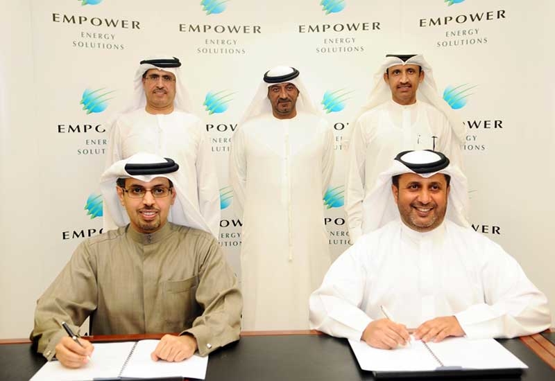 Eng Hamad Buamim (front left) of Dubai World signs the merger agreement with Empower CEO HE Ahmad Bin Shafar (front right) Eng Hamad Buamim (front left) of Dubai World signs the merger agreement with Empower CEO HE Ahmad Bin Shafar (front right)