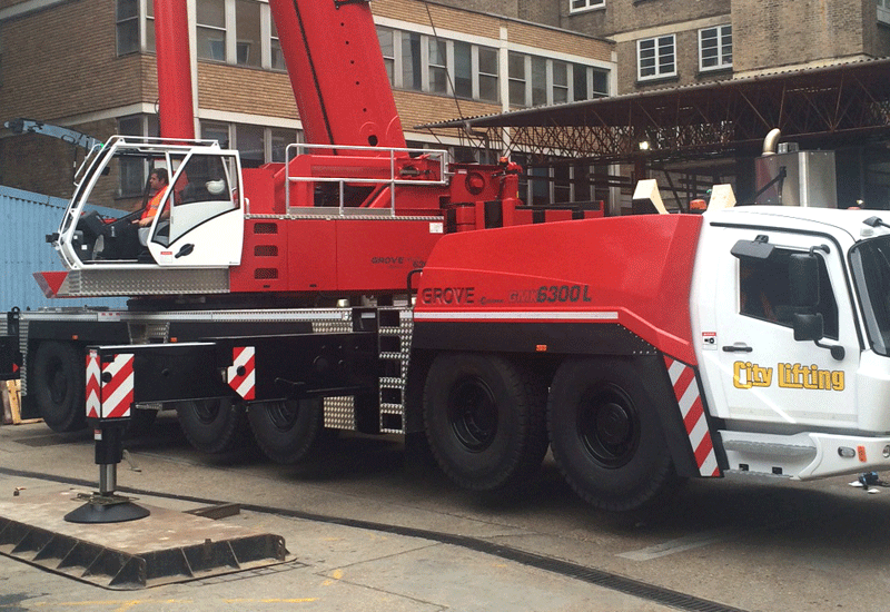 City Lifting's all-terrain Grove unit had to contend with a confined work area and a hole at the London job site. City Lifting's all-terrain Grove unit had to contend with a confined work area and a hole at the London job site.