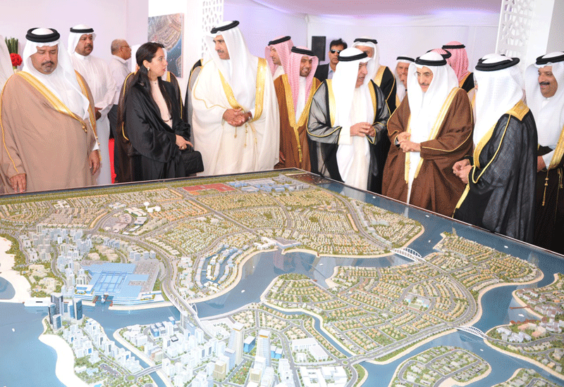 Dignitaries view a model of the development. Image supplied Dignitaries view a model of the development. Image supplied