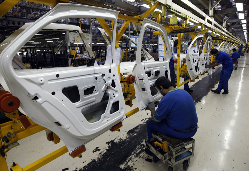 Peugeot models in production at an Iran Khodro facility near Tehran. Peugeot models in production at an Iran Khodro facility near Tehran.