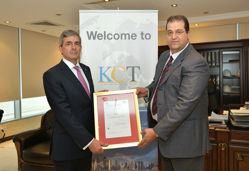 Theuns Kotze, Regional Director ME& Africa, BSI Middle East handing over the certificate to Salim Ata Jarrar, GM/Manager, KCT Qatar. Theuns Kotze, Regional Director ME& Africa, BSI Middle East handing over the certificate to Salim Ata Jarrar, GM/Manager, KCT Qatar.