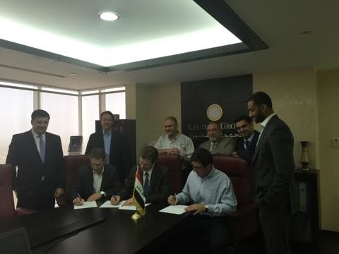 Hertz and Khudairi executives at the signing for the deal. Hertz and Khudairi executives at the signing for the deal.