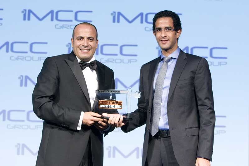 BAM International's Maged Fares (left) receives Project Manager of the Year Award from iMCC Group's Mina Nagib (right). BAM International's Maged Fares (left) receives Project Manager of the Year Award from iMCC Group's Mina Nagib (right).