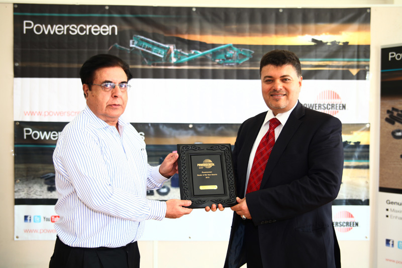 Rajen Khoda, director of sales – Middle East, Powerscreen makes a presentation to Ahmed Rashed, general manager of Genserv. Rajen Khoda, director of sales – Middle East, Powerscreen makes a presentation to Ahmed Rashed, general manager of Genserv.