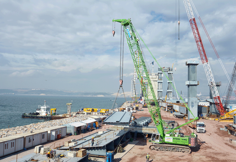 A Sennebogen 5500 is used to install a section of Turkey’s Izmit Bay Bridge. A Sennebogen 5500 is used to install a section of Turkey’s Izmit Bay Bridge.