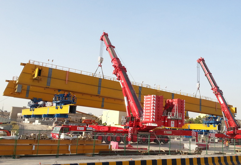 The Terex duo lifts the beam into place at a bridge near to Kuwait City. The Terex duo lifts the beam into place at a bridge near to Kuwait City.