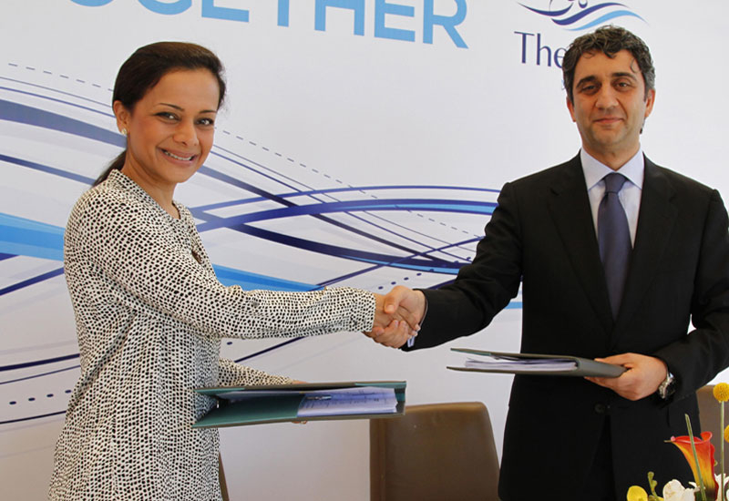 L-R: Al Turki Enterprises executive director Devki Khimji signs the agreement with The Wave, Muscat CEO Hawazen Esber L-R: Al Turki Enterprises executive director Devki Khimji signs the agreement with The Wave, Muscat CEO Hawazen Esber