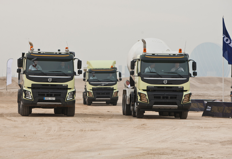 Volvo's latest FMX trucks prepare to take on the specially constructed off-road course. Volvo's latest FMX trucks prepare to take on the specially constructed off-road course.