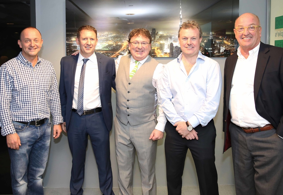 Paul Kirby, Commtech Middle East director(centre) with directors of ISG and Commtech. Paul Kirby, Commtech Middle East director(centre) with directors of ISG and Commtech.