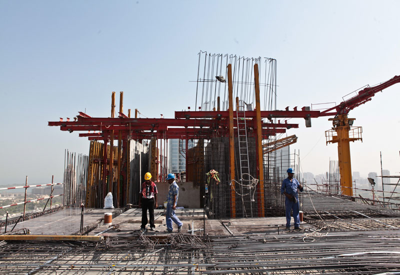 Shapoorji Pallonji workers on the site of the new Landmark HQ in Dubai Marina Shapoorji Pallonji workers on the site of the new Landmark HQ in Dubai Marina