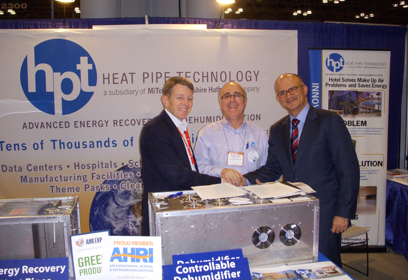 Navin Valrani (far right) signed the agreement with representatives from Heat Pipe Technology. Navin Valrani (far right) signed the agreement with representatives from Heat Pipe Technology.
