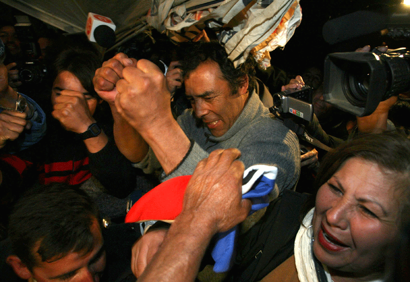 Florencio Avalos's father Alfonso celebrates the news of his son's successful rescue. Photo by HECTOR RETAMAL/AFP/Getty Images. Florencio Avalos's father Alfonso celebrates the news of his son's successful rescue. Photo by HECTOR RETAMAL/AFP/Getty Images.