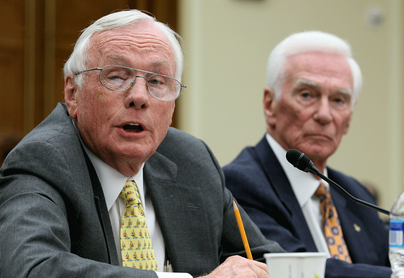 Retired aviator and astronaut Neil Armstrong (left), with fellow astronaut Eugene Cernan. Photo: Getty. Retired aviator and astronaut Neil Armstrong (left), with fellow astronaut Eugene Cernan. Photo: Getty.